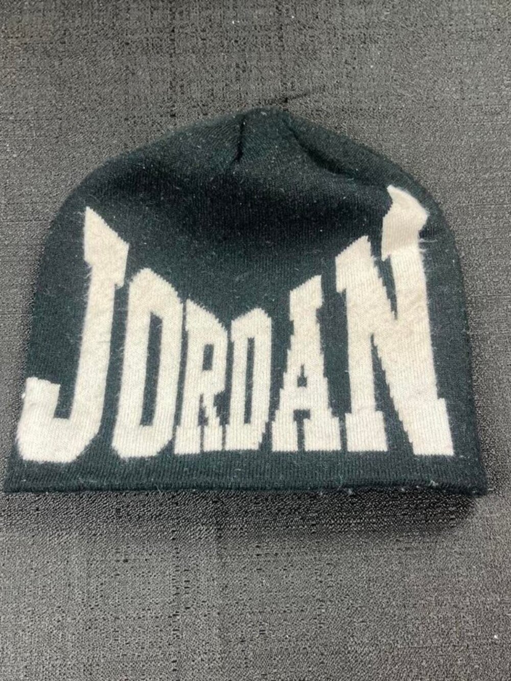 Authentic Jordan black beanie with white 'JORDAN' text . ONE SIZE FITS ALL !! I